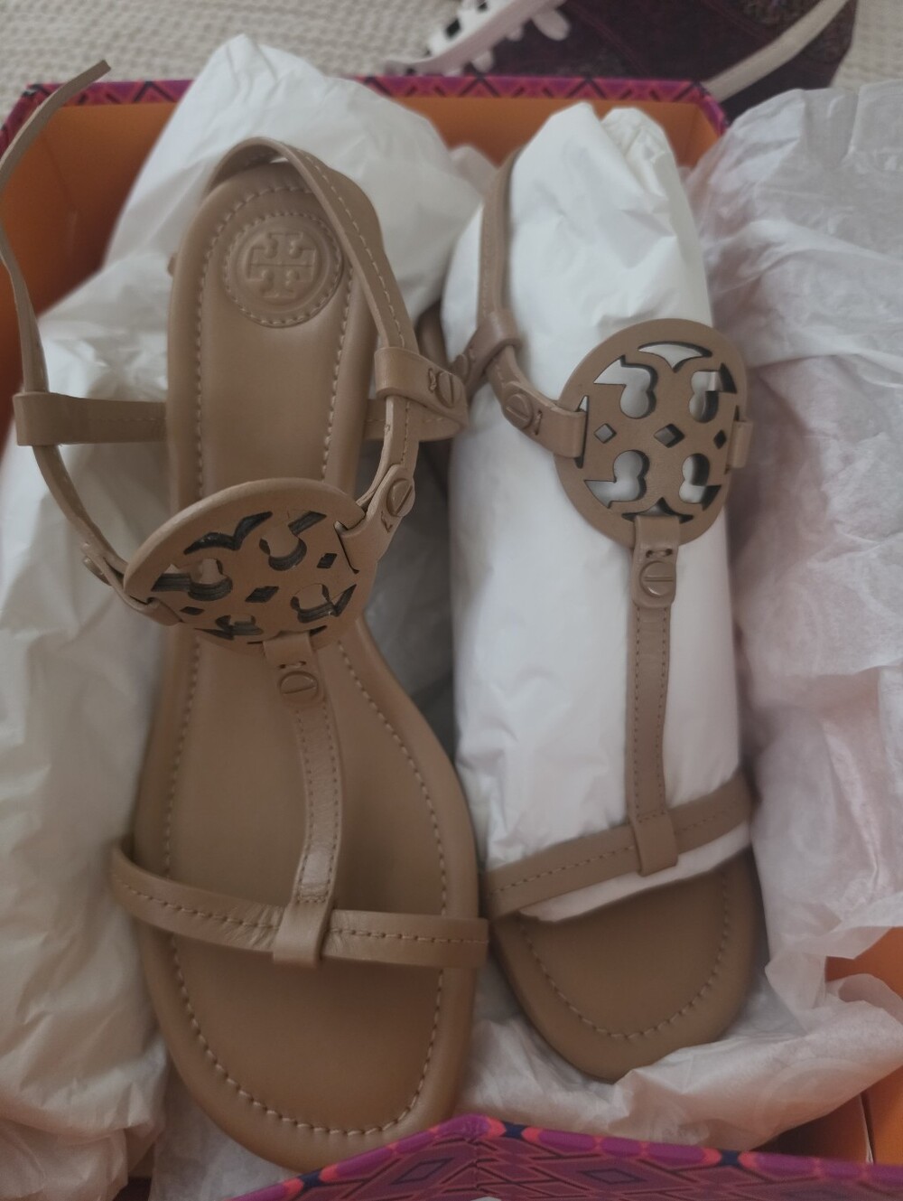 Women's Tan Leather T-Strap Sandals with Decorative Medallion